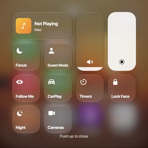 Control Center: Now Playing, volume and brightness sliders, Focus, Guest mode, CarPlay and more