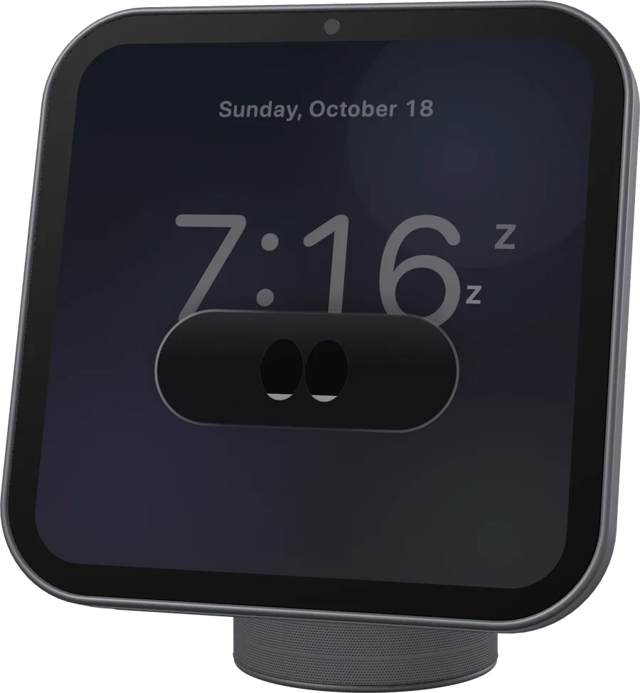 The desk pet asleep, with a z floating on the screen